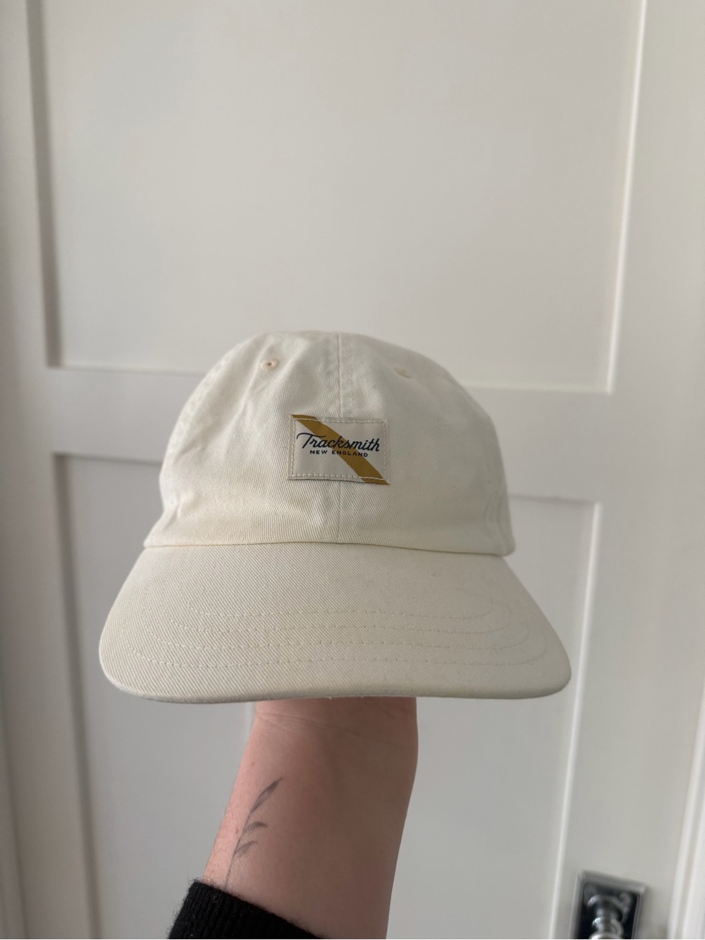 Tracksmith Cream Cap with Gold Logo Detail (Unisex)